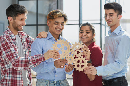 Business team connect pieces of gears. Teamwork, partnership and integration conceptの写真素材