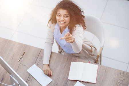 Focused girl agent lawyer manager sit desk chair work laptopの写真素材