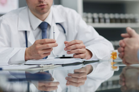 Young man getting information about electronic cigaretteの写真素材