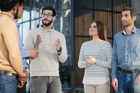 Business people stand and work in an office building