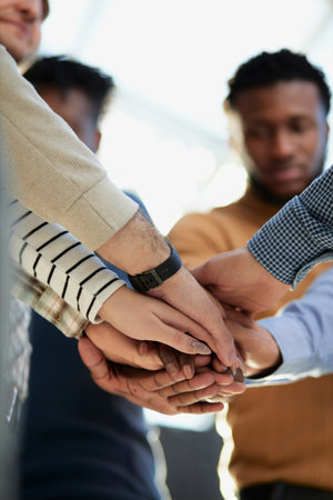 young business people putting their hands together. Stack of hands.の写真素材
