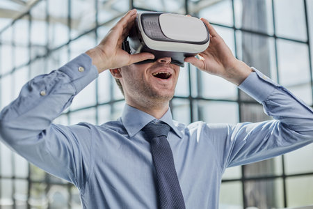 businessman in virtual reality headset in the office