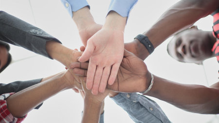 Closeup headshot of a young thoughtful african american businessman entrepreneur looking straight ahead.の写真素材