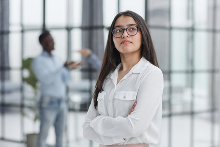 Young student or teacher looking at camera