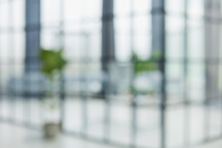 Blurred abstract grey glass wall from building background.の写真素材
