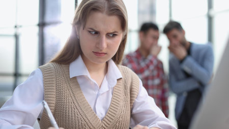 Successful Caucasian Businesswoman in Perfectly Stylish Suit Working on Laptop Computer on Top Floor Officeの写真素材