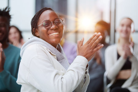 African american woman wearing casual clothes clapping and applauding happy and joyfulの写真素材