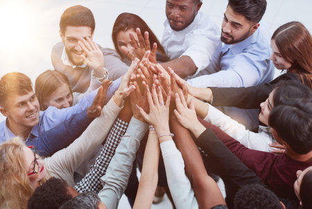 People of different ethnicities uniting to cooperate together