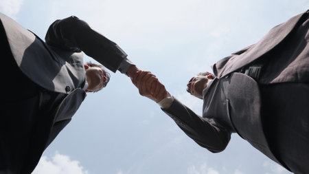 handshake of business partners on the street. bottom view