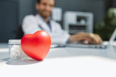 Doctor man holding red heart, Cardiology concept.の写真素材