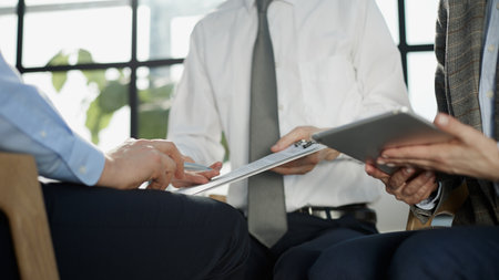 Salesmen are letting the male customers sign the sales contract