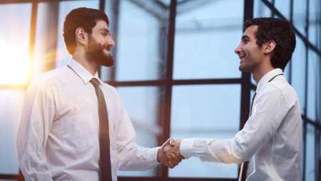 Businessmen making handshake business etiquette, congratulation, merger and acquisition conceptsの写真素材