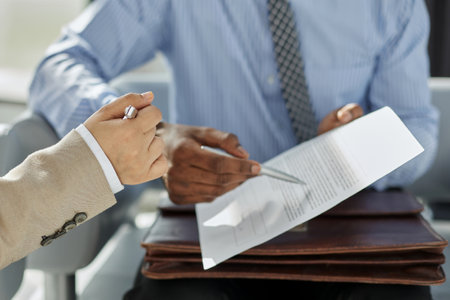 Lawyer, broker or HR manager signing a contract agreement with client or employee.の写真素材