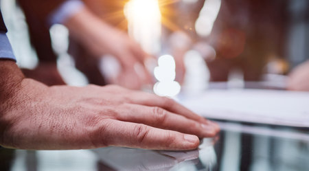 businessman with hand lying on the table, close-upの写真素材