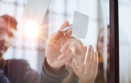 Young happy multiethnic diverse young professional creative team group students talking brainstormingの写真素材