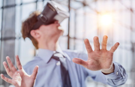 businessman in virtual reality headset in the office