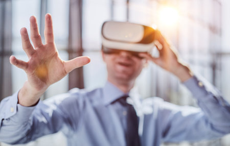 businessman in virtual reality headset in the officeの写真素材