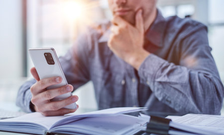 business man ceo wearing sitting in office using cell phone solutions.