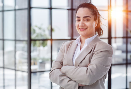 portrait of a young beautiful blonde business woman in the officeの写真素材