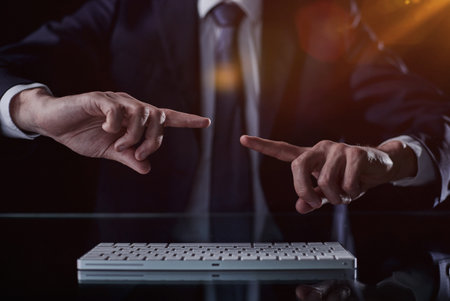 man about to type on the keyboardの写真素材