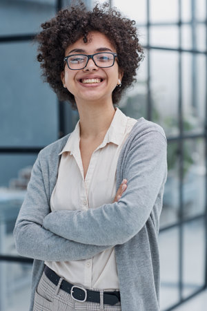 Female leader, manager or CEO with a smile, mission and vision in the officeの写真素材