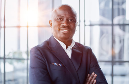 Handsome african american executive businessman in modern officeの写真素材