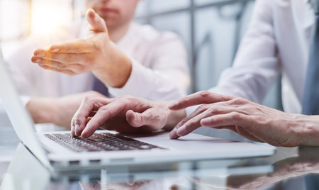 close up. two business men sitting at an office Deskの写真素材