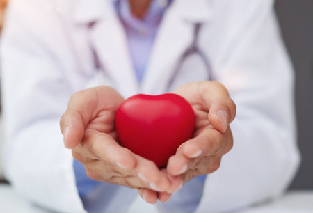Doctor man holding red heart, Cardiology concept.の写真素材