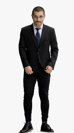 full-length portrait of a young man. standing isolated on white backgroundの写真素材