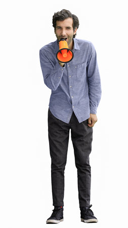 man isolated on a white background in business clothes with a loudspeaker in his handの写真素材