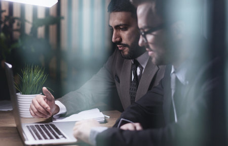 using easy accounting software for small business, stock traders analyzing marketの写真素材