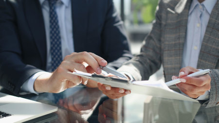 managers discuss and look for a solution in negotiations. Teamwork in the workplace.の写真素材