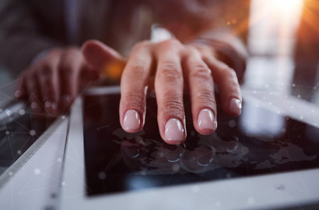close up. businessman pressing his finger on the screen of the digital tablet