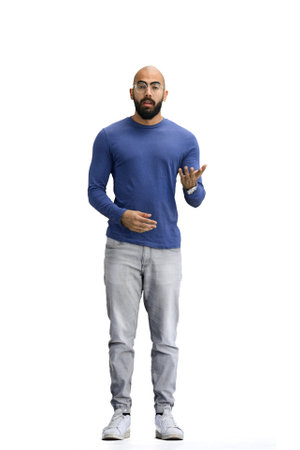A man, on a white background, in full height, gestures