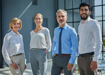 Businessmen stand in front of the office building