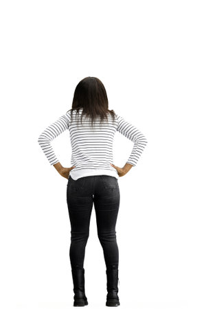 Woman, full-length, on a white background, hands on hips