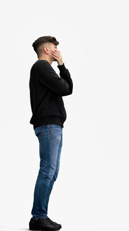 A man, full-length, on a white background, has an ideaの写真素材