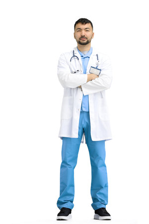The doctor, in full height, on a white background, crossed his armsの写真素材