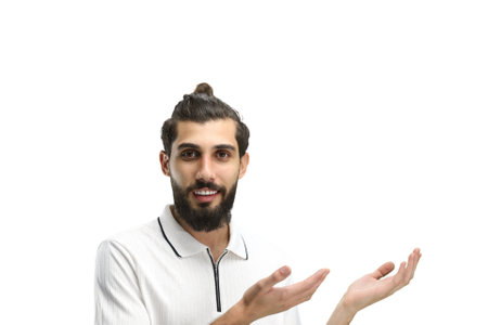 A man, close-up, on a white background, points to the side