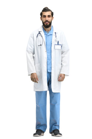 Male doctor, full-length, on a white backgroundの写真素材