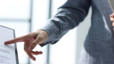 Discussing documents during a business meeting