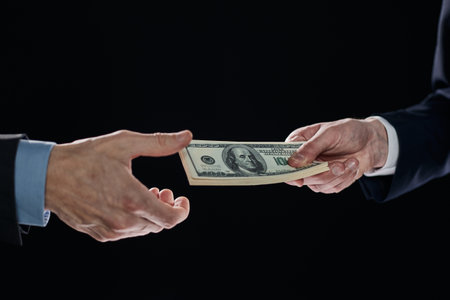 exchange of money cards between businessmen, close-upの写真素材