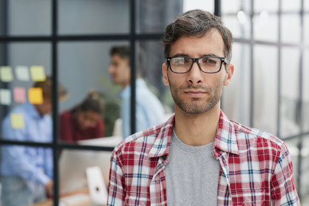 Closeup shot of cheerful young man in eyeglasses.の写真素材