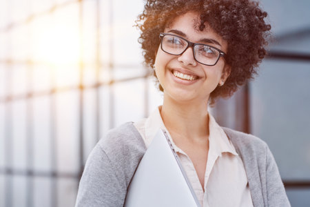 Female leader, manager or CEO with a smile, mission and vision in the officeの写真素材