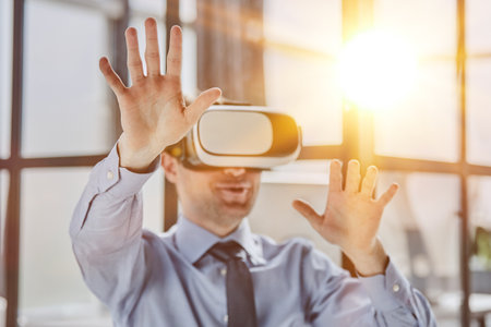 businessman in virtual reality headset in the officeの写真素材