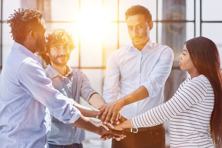 Successful Business Collaboration: Executives Greet with Handshake in Officeの写真素材