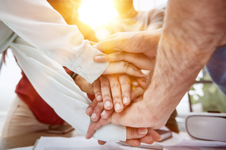 Team of people who are set up for productive work and a positive result. Close up.の写真素材