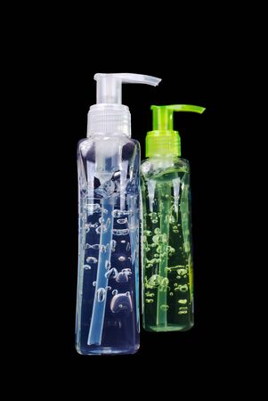 Original and aloe vera hand sanitisers on isolated black backgroundの写真素材