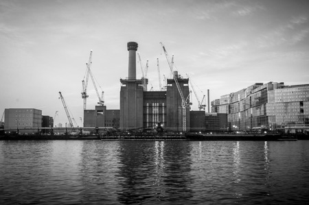 Battersea Power Station, London over river Thamesの写真素材
