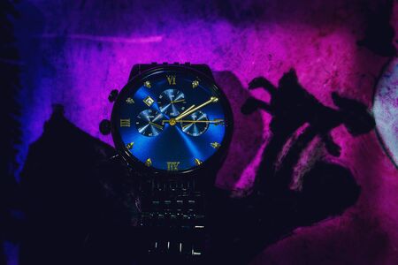 Men hand watch for fashion. Blue with black textureの写真素材